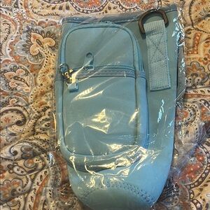 Women’s Stanley cup case thing and a little crossbody,selling both